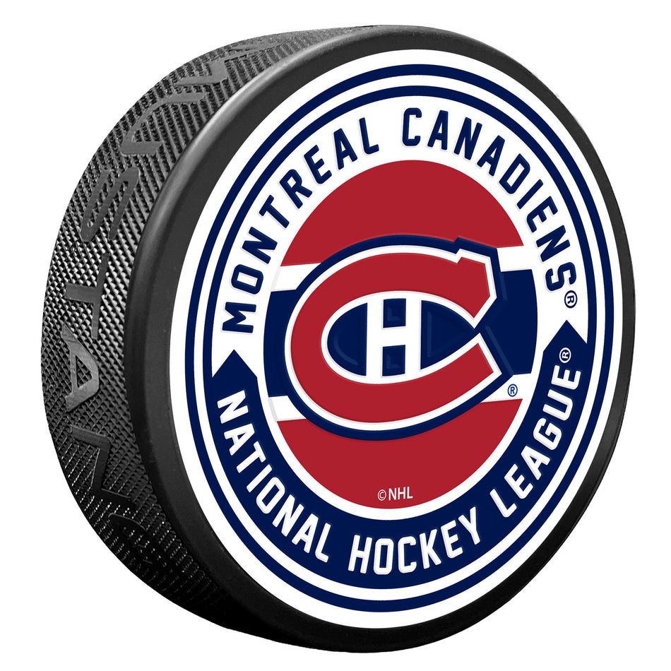 Montreal Canadiens NHL Arrow Textured Hockey Puck product image 1, provided for visual reference and product detail review